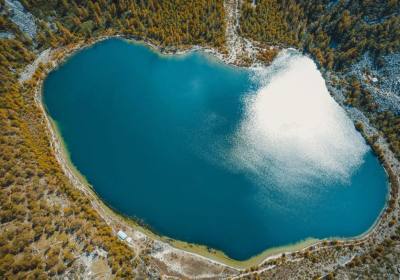 【Mini2-8人团】成都到九寨沟+黄龙+四姑娘山+达古冰川汽车VIP四日游线路、川西小环线旅游多少钱